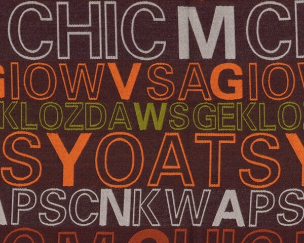 Jacquard-Wollstoff, Wolltuch "Lettera" mit Schrift , orange-hellgrün-dunkelbraun