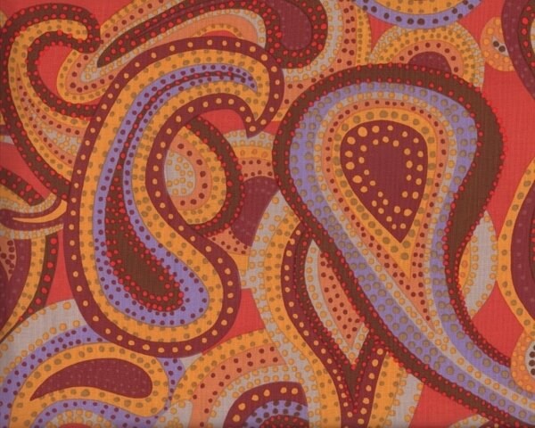 Patchworkstoff "Dancing Paisley" mit großen Punkte-Paisleys, terracotta-braun-goldgelb