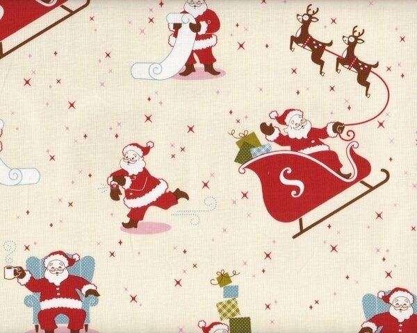 Patchworkstoff "Sleigh Ride" mit Weihnachtsmann im Rentier-Schlitten, rot-cremé