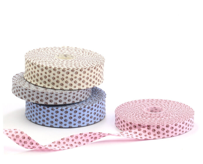 Baumwoll-Schrägband mit Tatzen rosa 18 mm